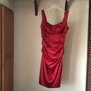 Radiant red! Form fitting satin.Size 8.Worn once